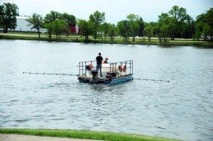 A city crew spraying herbicide