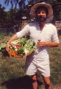 An older photo of me harvesting vegetables I grew and enjoying wine I made. 